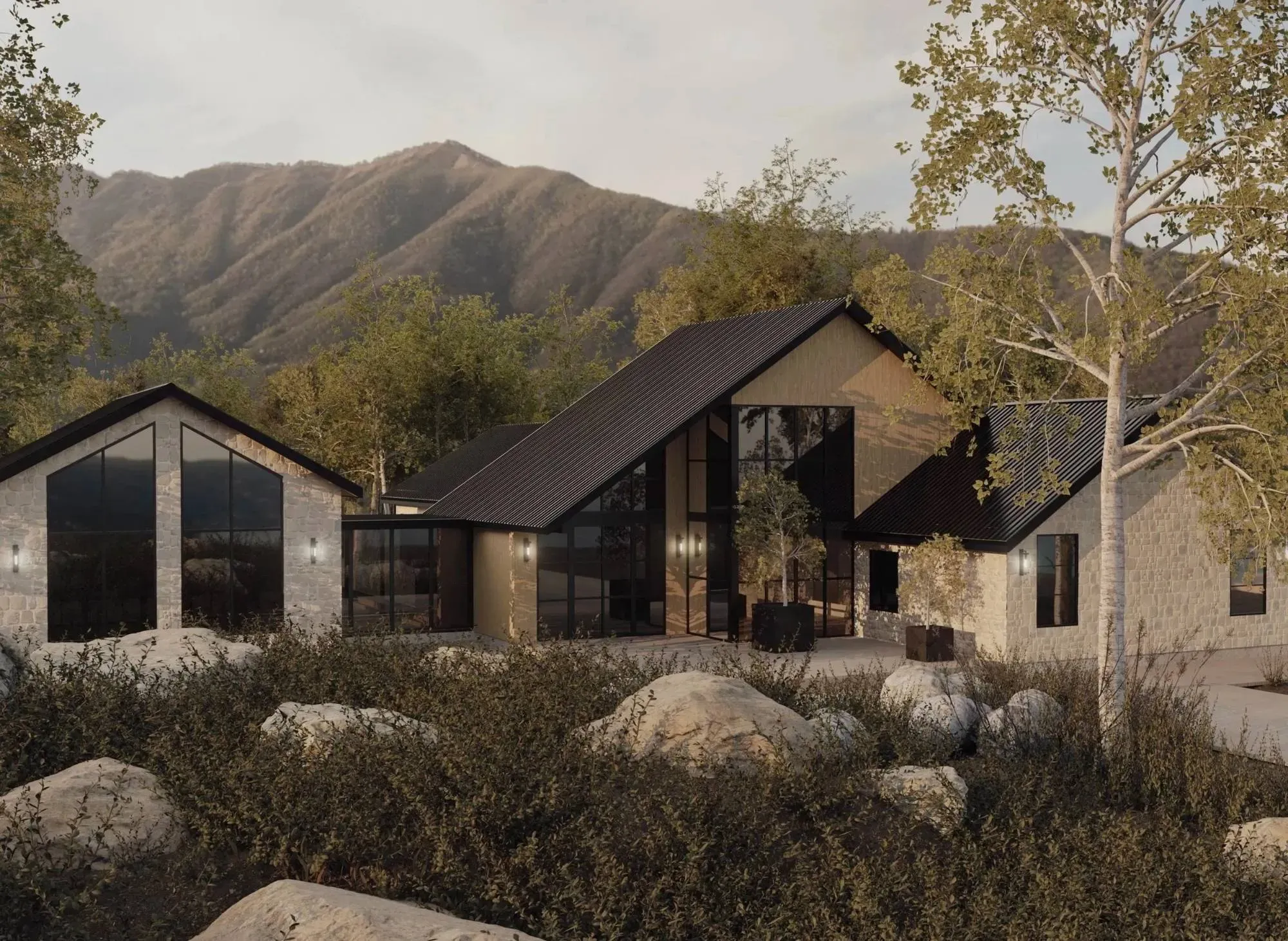 Modern mountain home with a steep metal roof, stone and timber siding, and tall black-framed windows